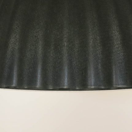 Under klokke-loftslampen